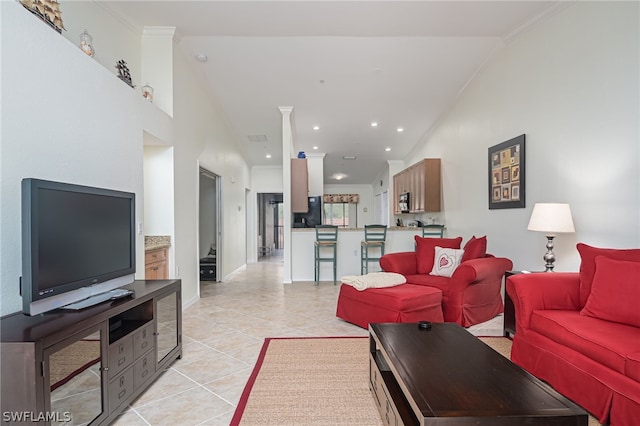 tiled living room featuring crown molding