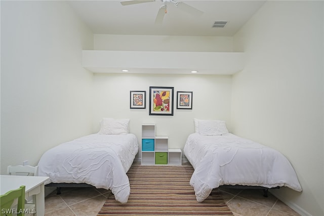 bedroom with tile flooring and ceiling fan