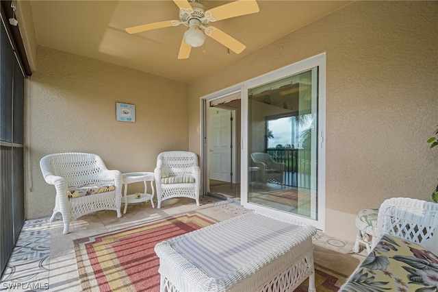 exterior space with a patio and ceiling fan