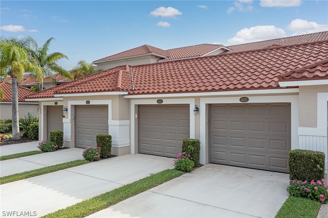 view of front of home with a garage