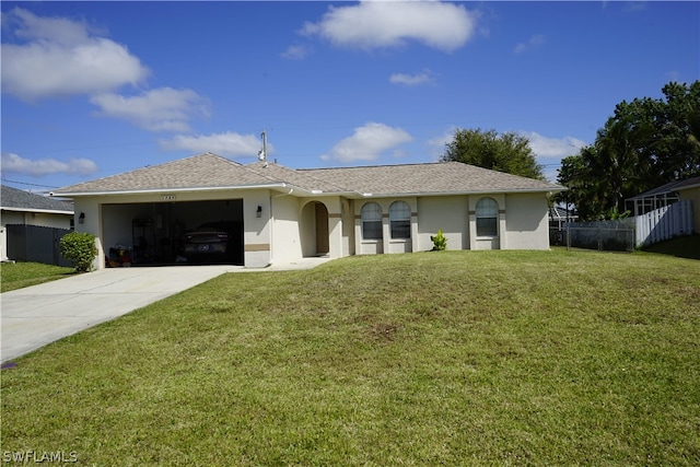 ranch-style house with a front lawn and a garage