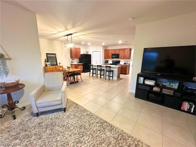 living room featuring light tile patterned flooring