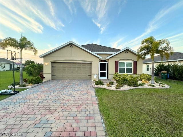 ranch-style home with a front lawn and a garage