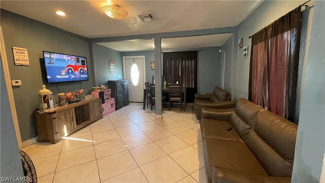 living room with light tile flooring