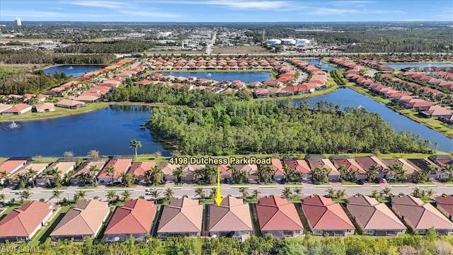 bird's eye view with a water view