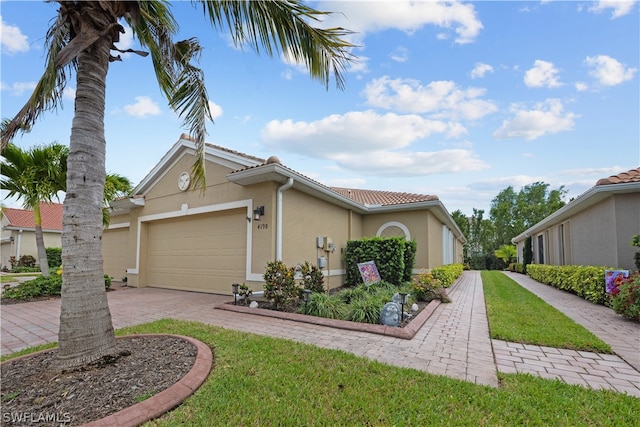 view of front of home with a garage