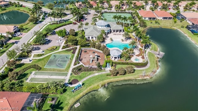 birds eye view of property with a water view