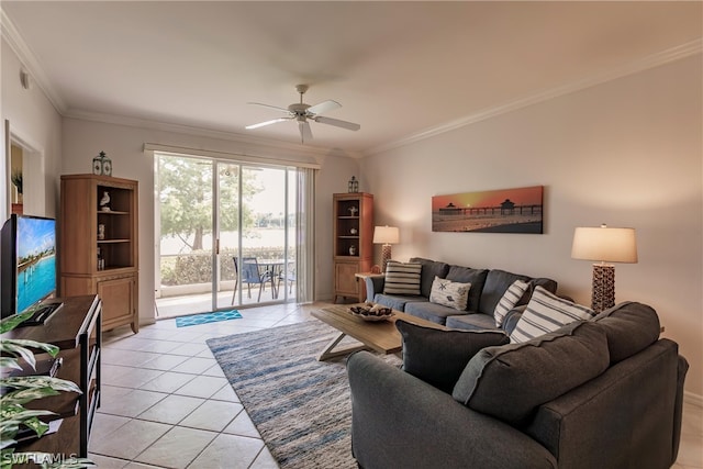 living room with ceiling fan, ornamental molding, and light tile flooring