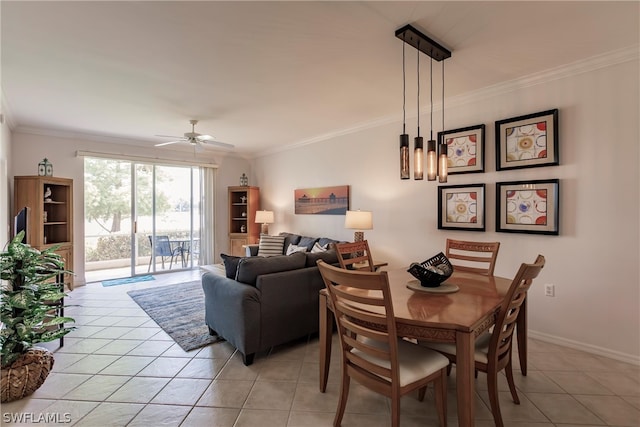 dining area with light tile floors, crown molding, and ceiling fan