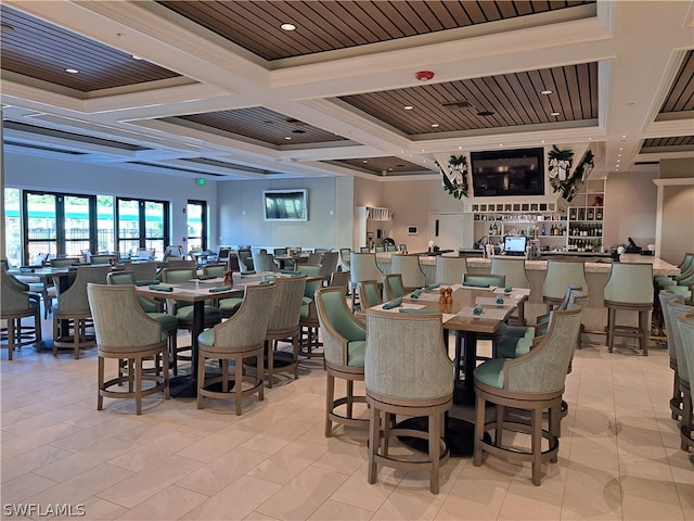 dining space featuring ornamental molding, coffered ceiling, wooden ceiling, and light tile flooring