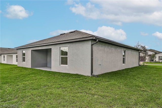 view of home's exterior featuring a lawn