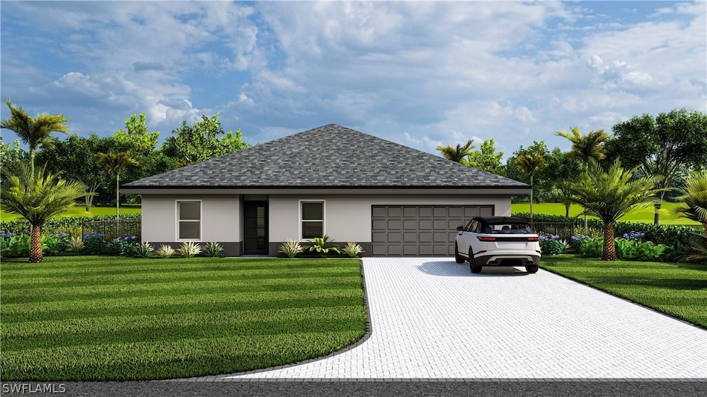 view of front of property with a garage and a front yard