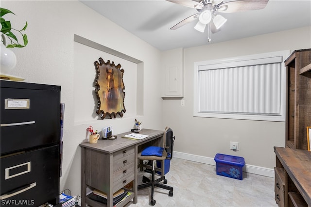 tiled office space featuring ceiling fan