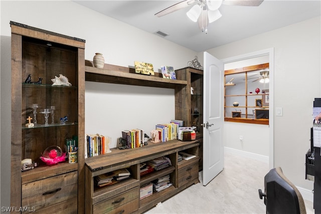 interior space featuring ceiling fan