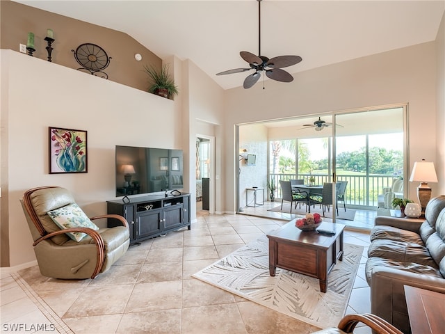 living room featuring high vaulted ceiling, ceiling fan, and light tile floors