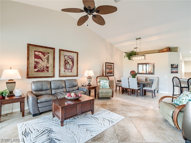 living room featuring high vaulted ceiling, ceiling fan, and light tile floors