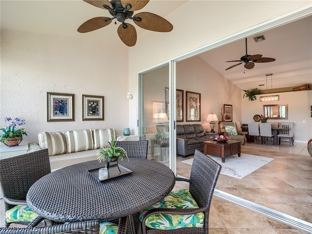 view of terrace featuring an outdoor living space and ceiling fan