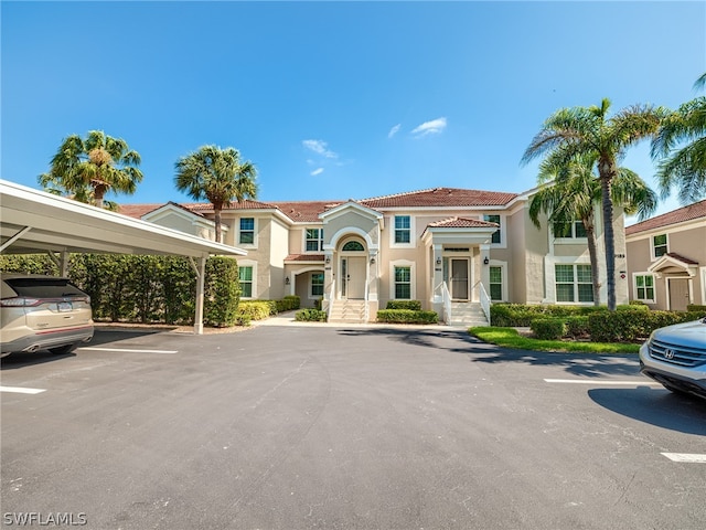 view of front of house featuring a carport