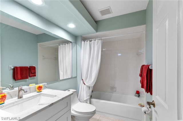 full bathroom with shower / tub combo with curtain, vanity, toilet, and tile patterned flooring