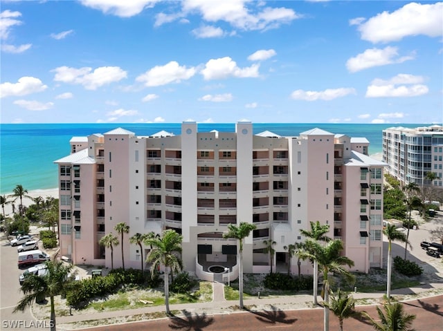 view of building exterior featuring a water view