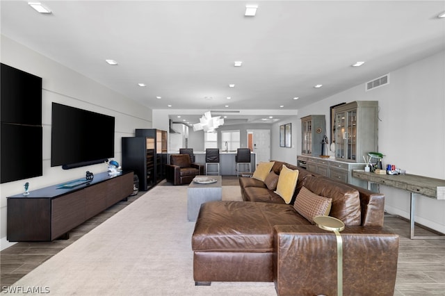 living room with light hardwood / wood-style floors