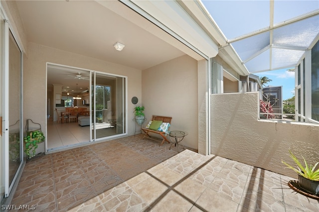 exterior space with ceiling fan