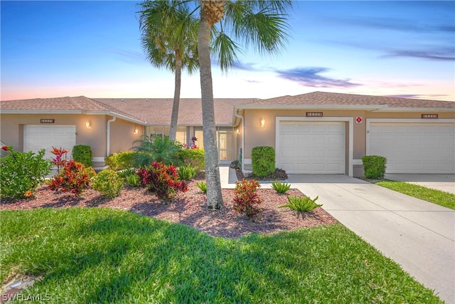 ranch-style home with a garage