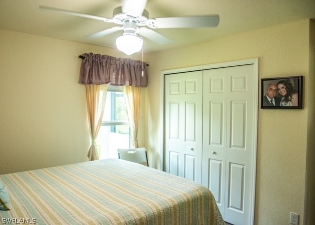 bedroom featuring a closet and ceiling fan