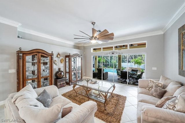 living room featuring ceiling fan, light tile patterned floors, and crown molding