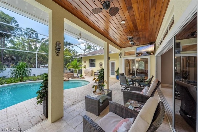 exterior space featuring ceiling fan, a patio, and a lanai