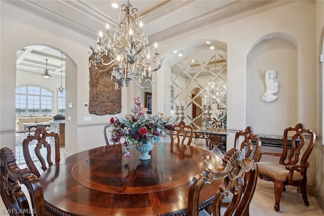 tiled dining space with beamed ceiling, ornamental molding, ceiling fan with notable chandelier, and coffered ceiling