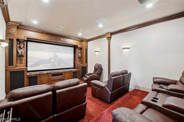 cinema room featuring ornamental molding, built in features, and decorative columns