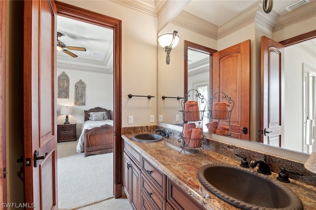 bathroom featuring ornamental molding, double vanity, and ceiling fan