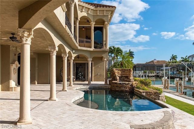 view of pool featuring a patio