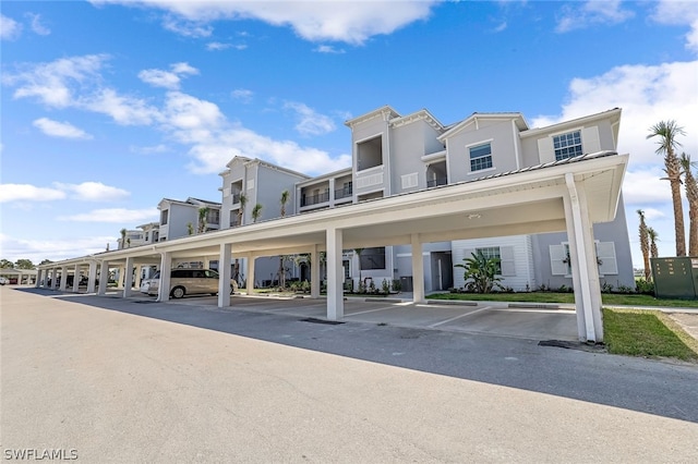 view of property with covered parking