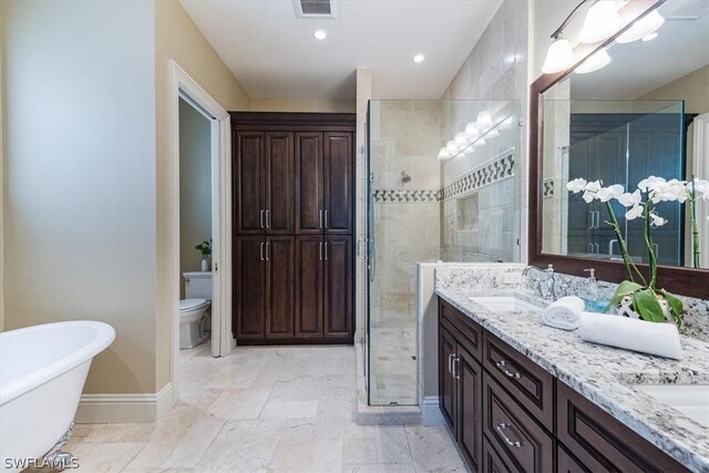 full bathroom with vanity, toilet, and independent shower and bath