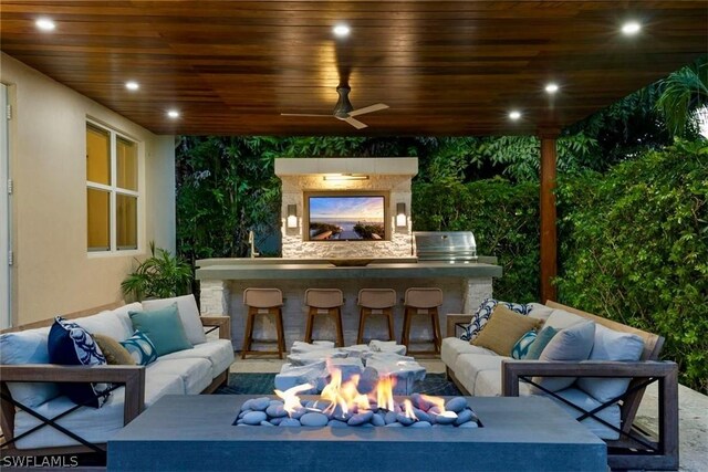 view of patio / terrace with grilling area, ceiling fan, and an outdoor hangout area