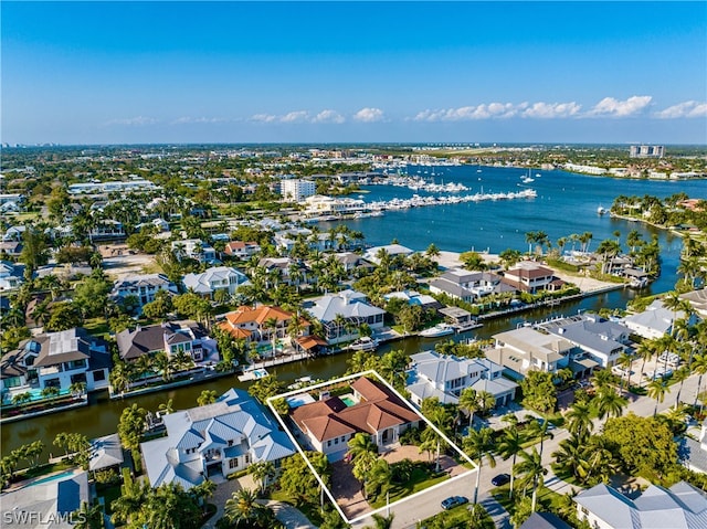 drone / aerial view with a water view