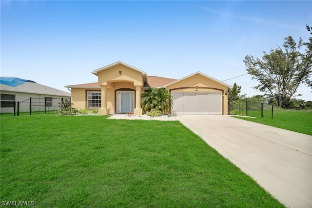 view of front of house with a front yard and a garage