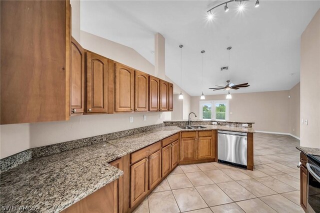 kitchen featuring dishwasher, kitchen peninsula, sink, ceiling fan, and light stone counters