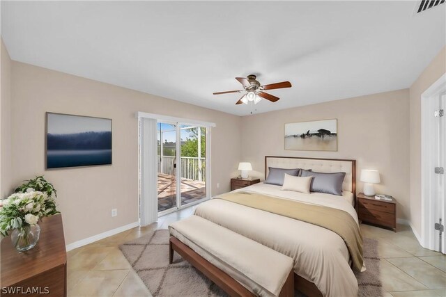 tiled bedroom featuring ceiling fan and access to exterior