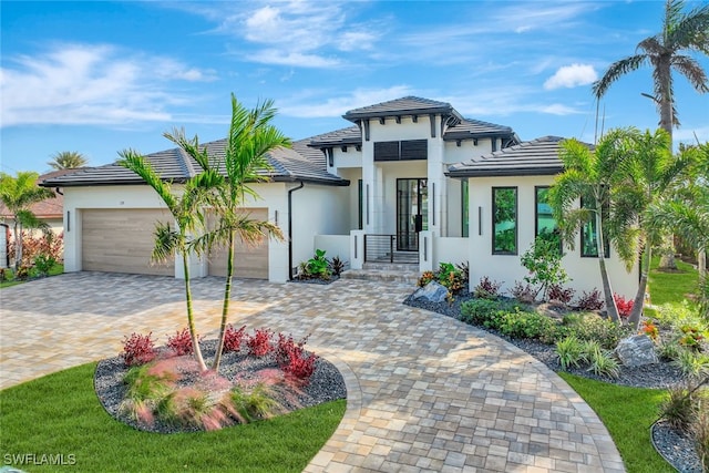 view of front of property featuring a garage