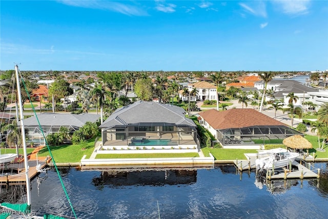 birds eye view of property featuring a water view