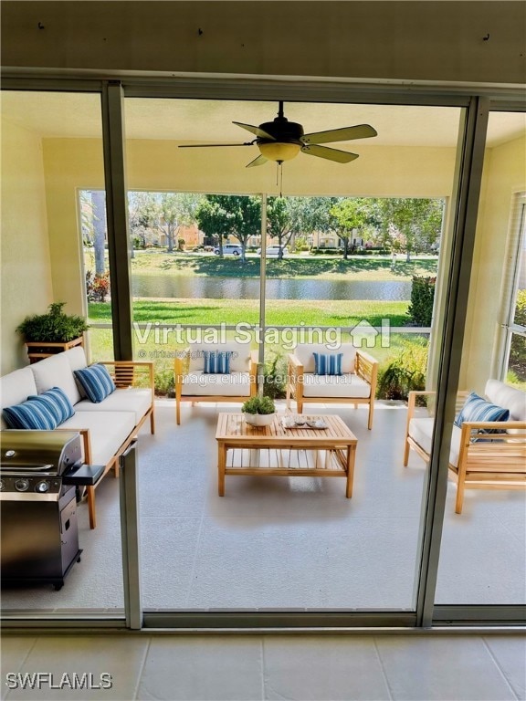 view of patio / terrace featuring ceiling fan, an outdoor hangout area, and grilling area