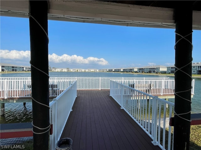 wooden deck with a water view