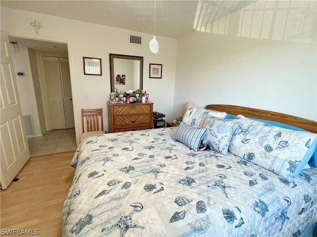 bedroom featuring light hardwood / wood-style floors