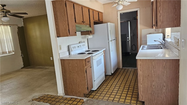 kitchen with backsplash, sink, white range with electric stovetop, and ceiling fan