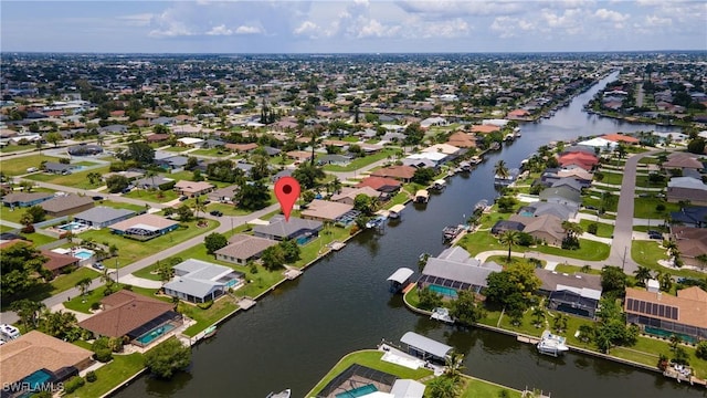 2201 SE 10th Ave, Cape Coral, FL 33990 - aerial view of property and surrounding area with nearby suburban area and a large body of water