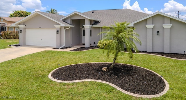 single story home featuring a garage and a front yard