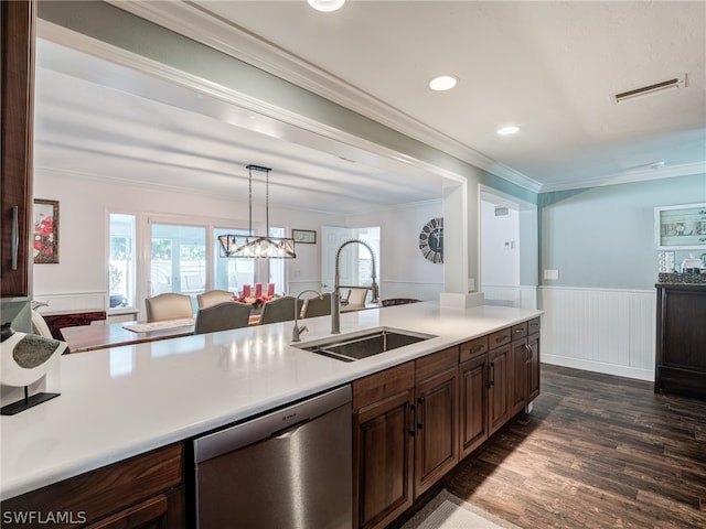 kitchen featuring visible vents, dishwasher, wainscoting, ornamental molding, and a sink